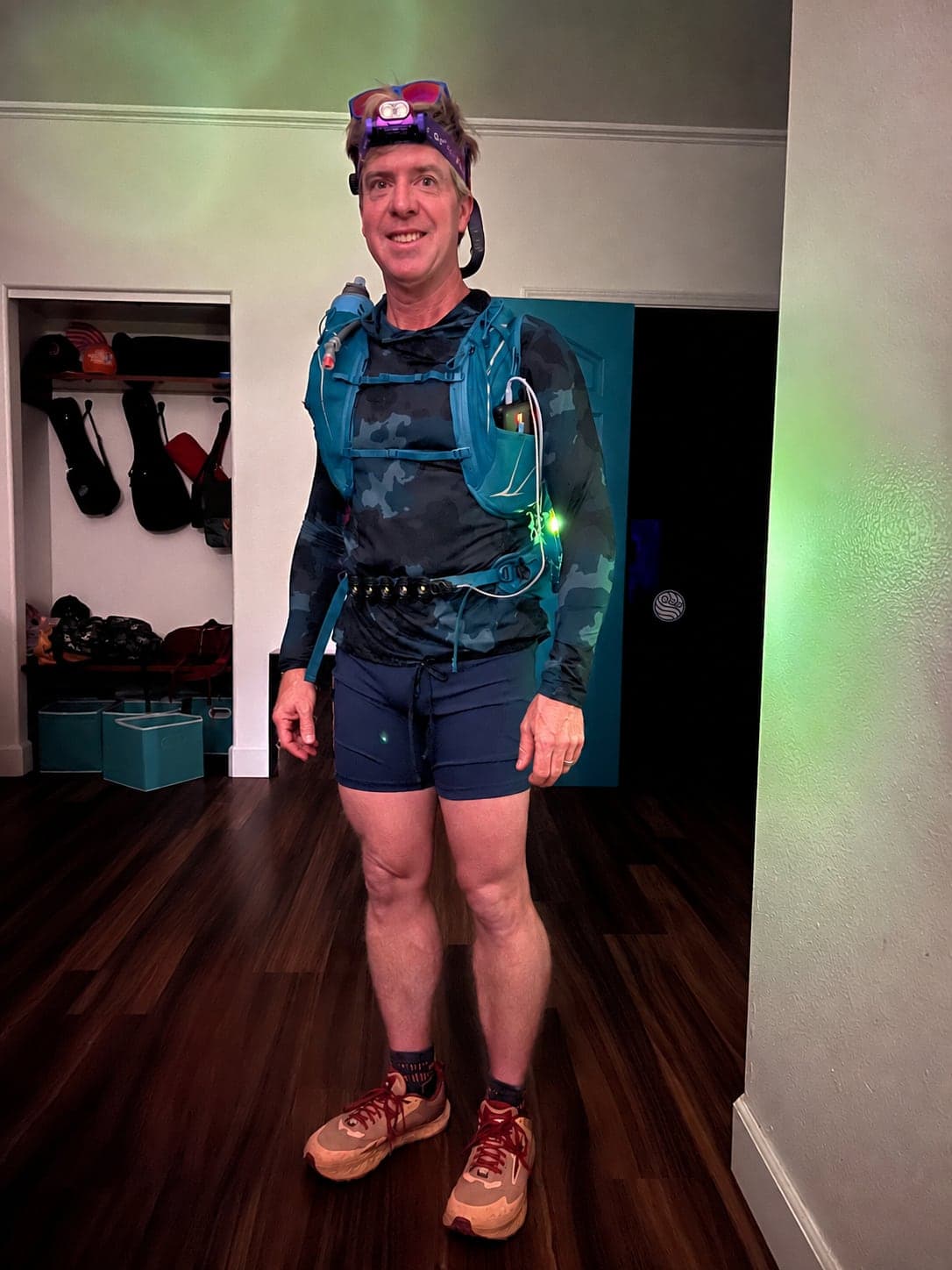 Rusty geared up in a hydration vest and headlamp, about to head out on a roughly 50-mile birthday run.
